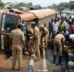 விழுப்புரம் அருகே பரபரப்பு: தேசிய நெடுஞ்சாலையில் கவிழ்ந்த பாமாயில் லாரி – மனிதாபிமானத்துடன் உதவிய போலீசார்!